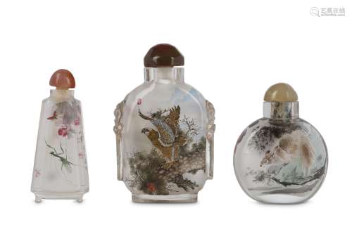 THREE CHINESE INSIDE-PAINTED GLASS SNUFF BOTTLES. 19th/20th Century. Painted with birds, insects and
