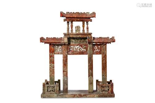 A CHINESE CARVED SOAPSTONE PAILOW. Qing Dynasty, 19th Century. Carved to depict a pillared gate with