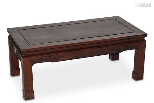 A CHINESE WOOD LOW TABLE. Late Qing Dynasty. With a rectangular top and shaped apron carved with