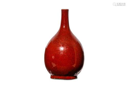 A CHINESE COPPER-RED GLAZED VASE. Qing Dynasty. Of pear-shaped form, with a rounded body on a