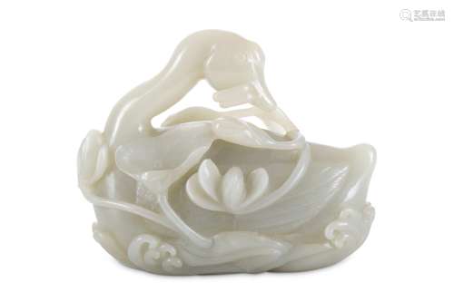 A CHINESE PALE CELADON JADE 'GOOSE' CARVING. With head gracefully turned to sinister, the beak