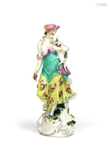 A large Meissen figure of a shepherdess mid 18th c...;