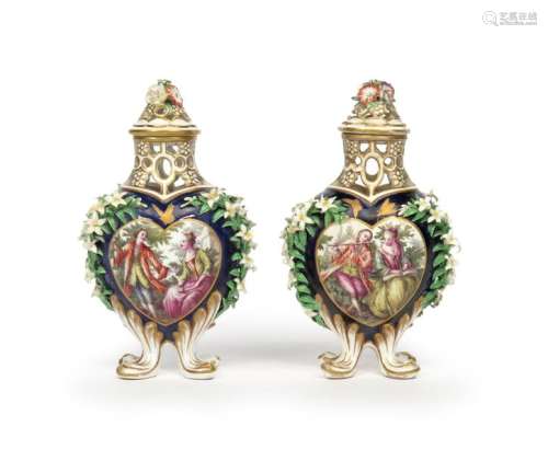 A rare pair of Chelsea pot pourri vases and covers...;