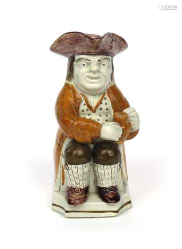 A pearlware Toby jug c.1800, of Ordinary type, wea...;