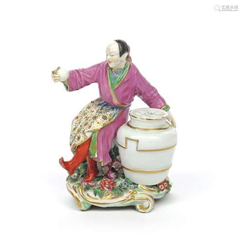 A rare Chelsea chinoiserie flower holder figure c....;