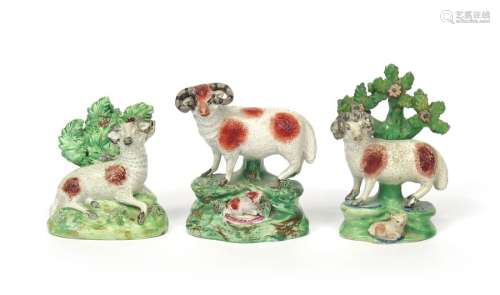 Three Staffordshire pearlware figures of rams c.18...;