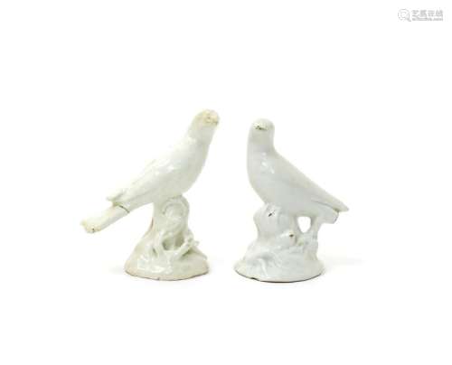 A matched pair of Bow white glazed models of finch...;