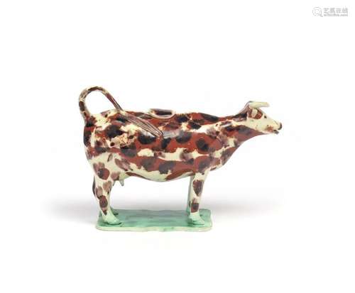 A Staffordshire pearlware cow creamer and cover la...;