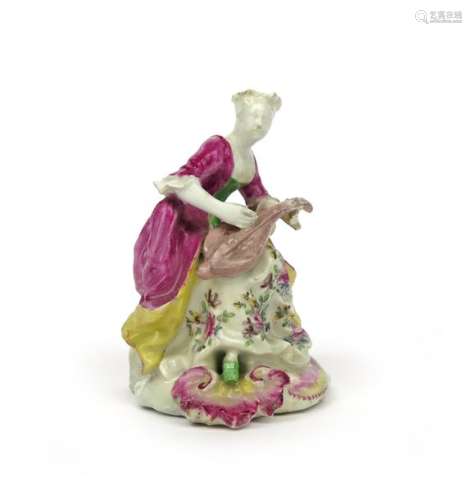 An early Derby figure of a female musician c.1756 ...;