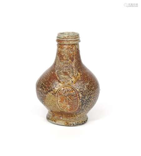 A small Bellarmine jug dated 1600, the squat globu...;