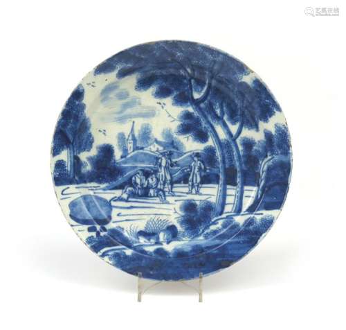 A large London delftware charger c.1720, painted i...;
