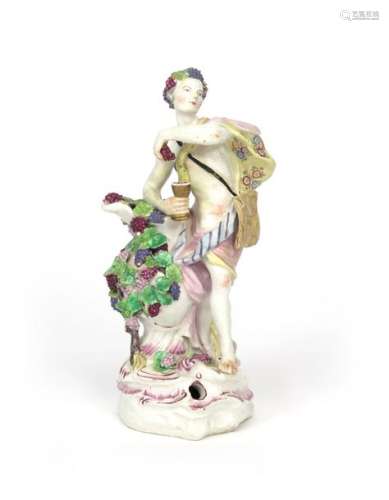 A Bow figure of Bacchus c.1760, standing before a ...;