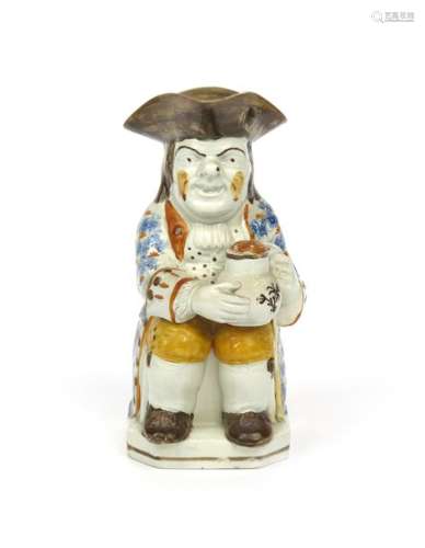 A good Pratt ware Toby jug c.1800, seated and rest...;