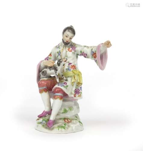 A Meissen chinoiserie figure of a man and dog 20th...;