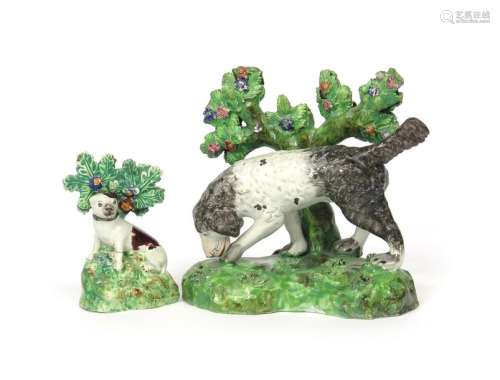 Two Staffordshire pearlware figures of dogs c.1810...;