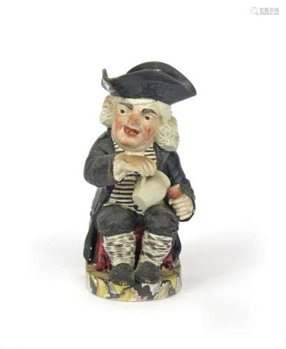A Drunken Parson Toby jug c.1810, seated and pouri...;