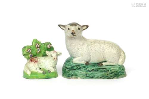 Two Staffordshire pearlware figures of sheep or la...;