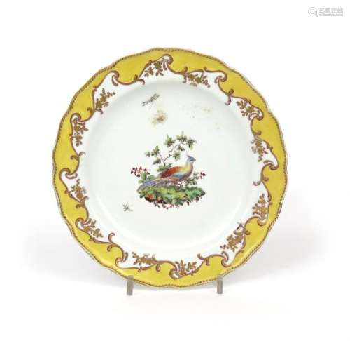 A Chelsea plate c.1760, painted with an exotic bir...;