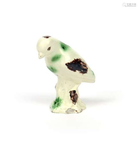A creamware figure of a bird c.1770, modelled as a...;