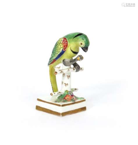 A small Staffordshire porcelain figure of a parrot...;