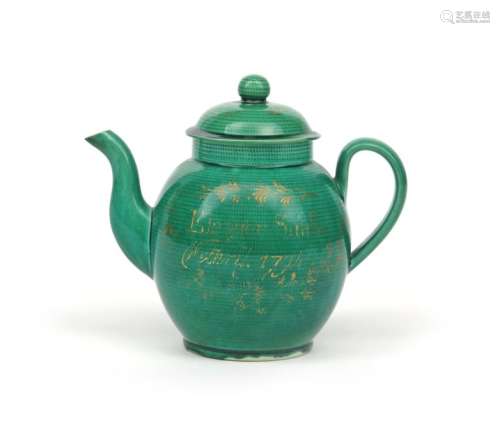 A green glazed creamware teapot and cover dated 17...;