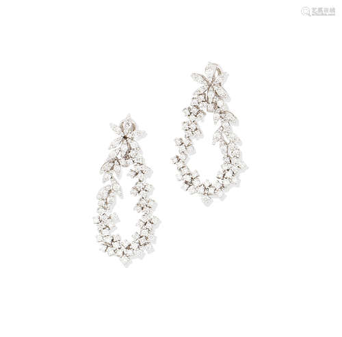 A pair of diamond pendent earrings