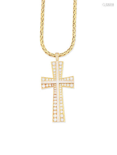 A diamond cross pendant and chain