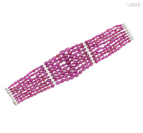 A multi-strand ruby bead and diamond bracelet