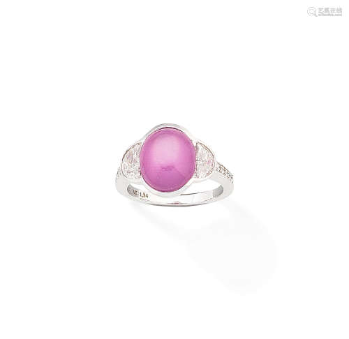 A pink star sapphire and diamond ring