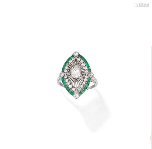An emerald and diamond plaque ring
