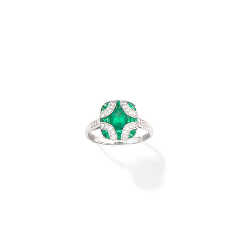 An emerald and diamond plaque ring