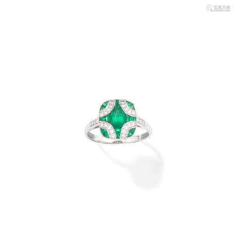 An emerald and diamond plaque ring