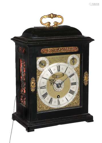 ϒ A rare gilt brass mounted ebony alarm timepiece of month duration with silent-pull quarter-repeat