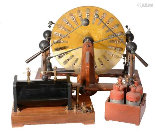 A mahogany brass and glass Wimshurst electrostatic generating machine