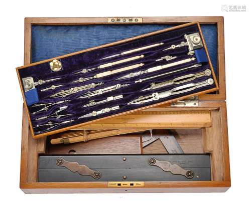 ϒ An Edwardian/George V oak magazine of draughtsman’s drawing instruments