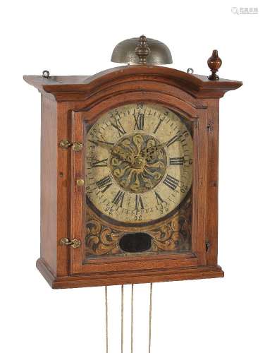 An interesting Continental iron-framed weight-driven wall clock