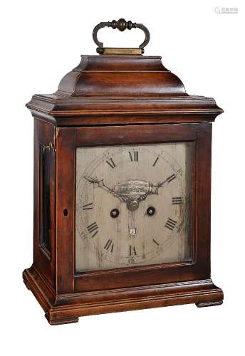 A fruitwood table timepiece