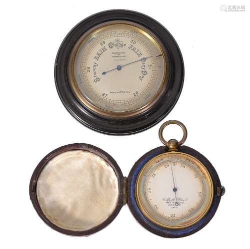 ϒ A Victorian gilt brass cased aneroid pocket barometer