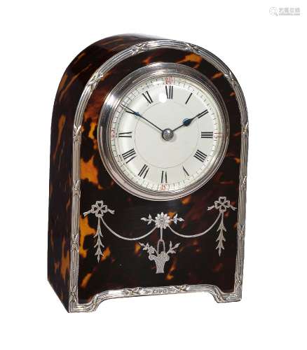 ϒ An Edwardian silver mounted tortoiseshell small desk timepiece