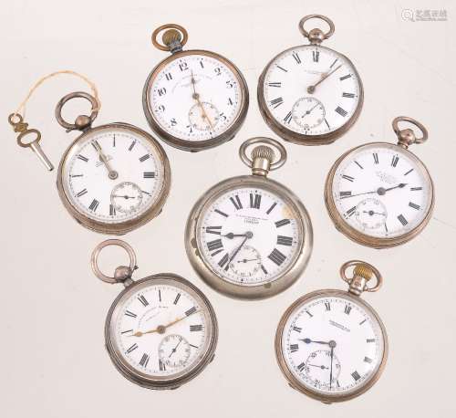 A collection of white metal open face pocket watches