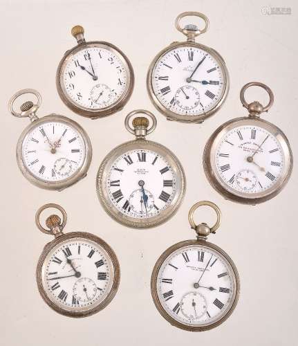 A collection of seven white metal pocket watches
