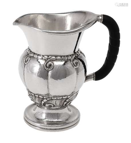 ϒ Georg Jensen, a Danish silver water jug or pitcher