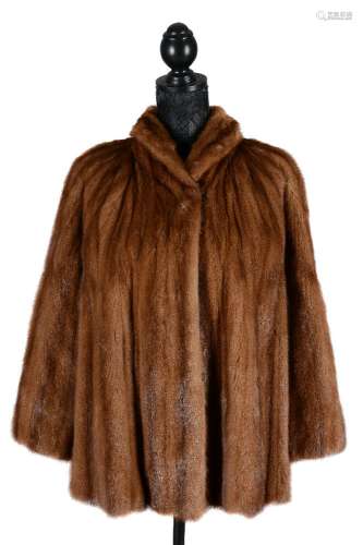 A brown mink fur cape coat