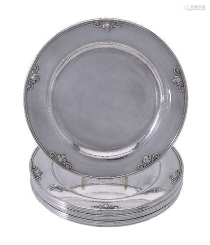 Georg Jensen, a set of ten Danish silver Acorn pattern dinner plates