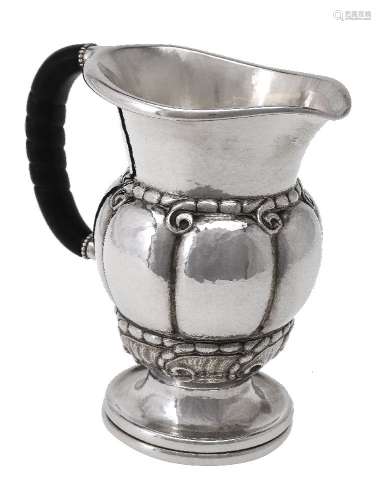 ϒ Georg Jensen, a Danish silver water jug or pitcher