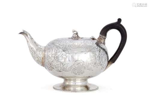 A George III silver compressed spherical tea pot by James Darquits