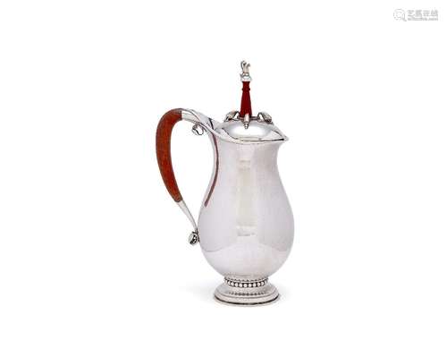 ϒ Georg Jensen, a Danish silver baluster chocolate pot or pitcher