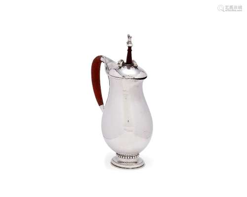 ϒ Georg Jensen, a Danish silver baluster chocolate pot or pitcher