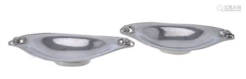 Georg Jensen, a pair of Danish silver Blossom pattern long oval dishes