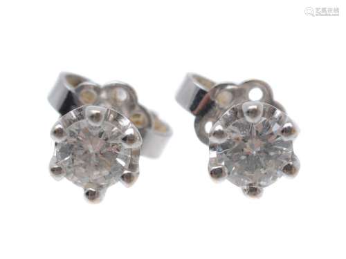A pair of diamond ear studs